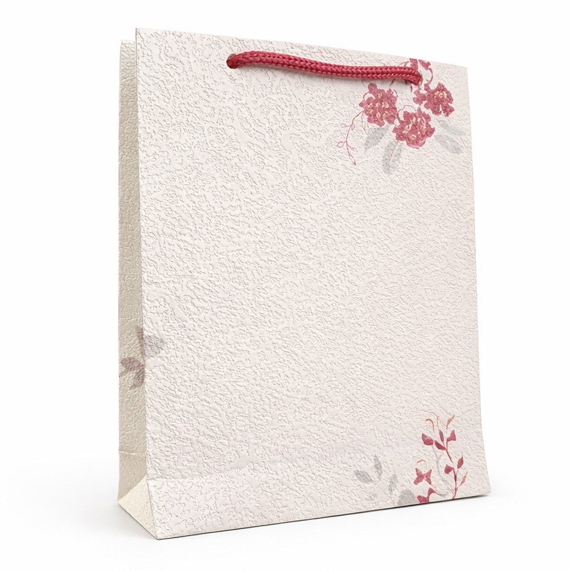 خرید ساک هدیه دست ساز لوکس مدل رز سلطنتی Royal Rose gift bag، ساخته شده از کاغذ دیواری برجسته. مناسب عطر، اکسسوری و هدیههای خاص. ابعاد 18×16×5 سانتیمتر.
